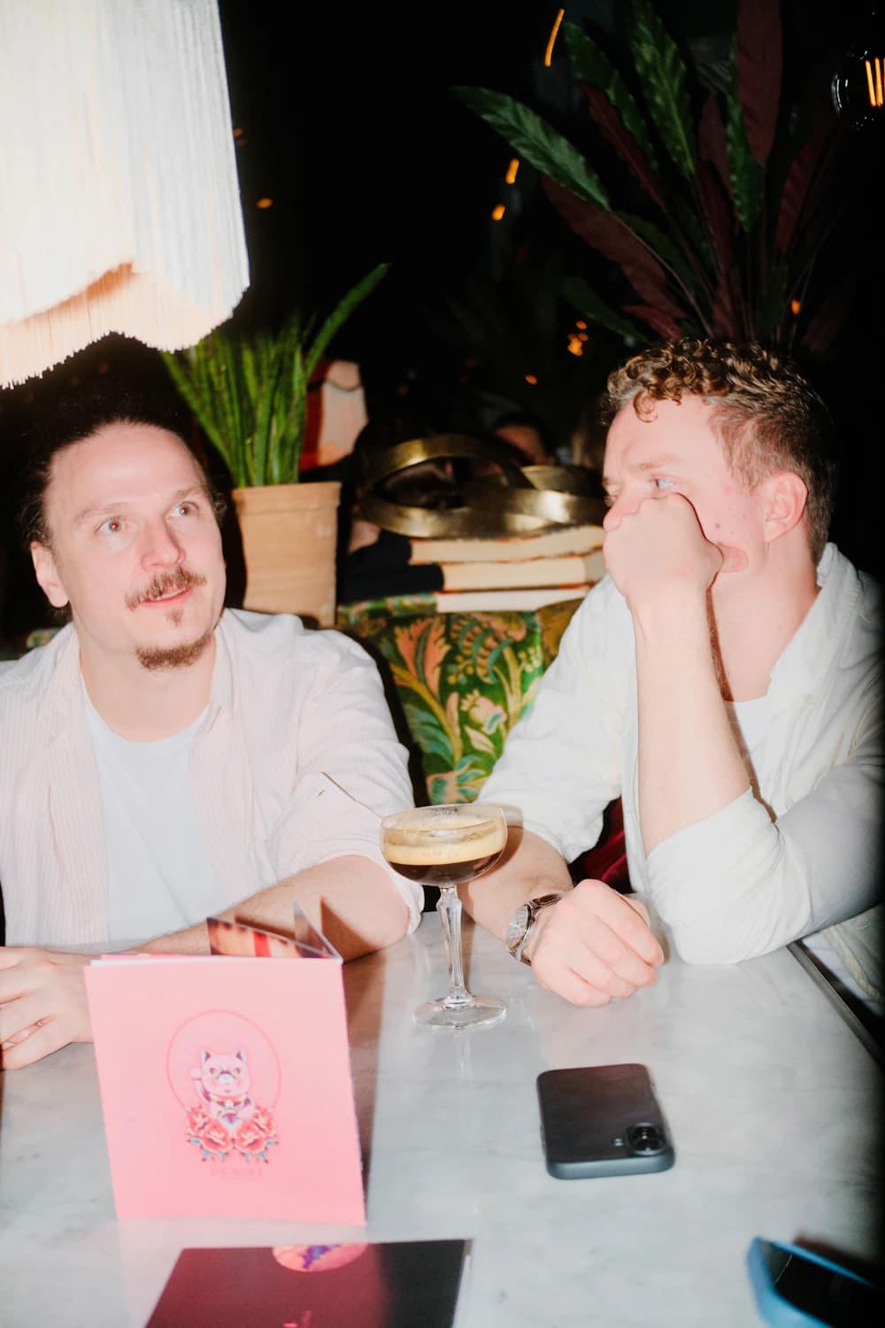 Two colleagues at a bar
