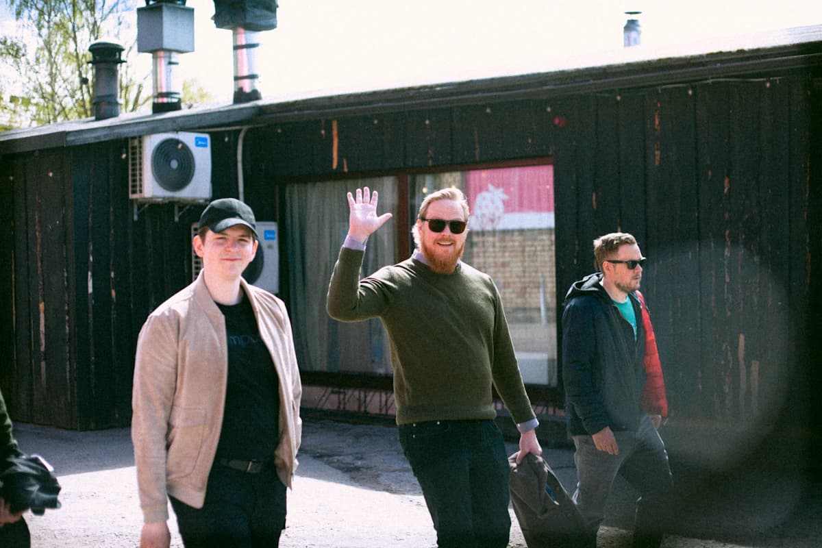 Colleagues waving